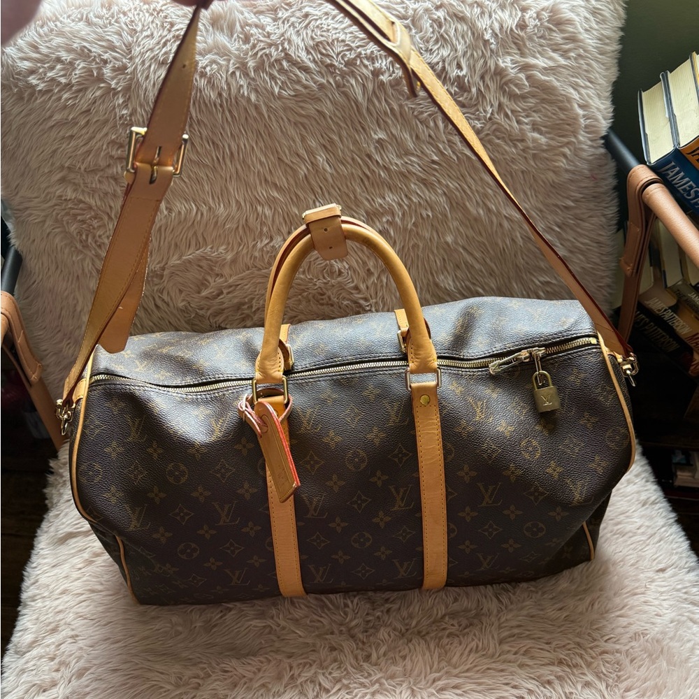Louis Vuitton Brown Monogram keepall 50cm. Gently used. Has some minor flaws.